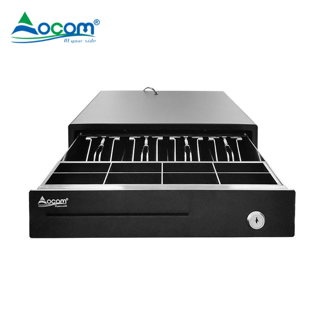 Kasë lekësh heavy-duty OCOM ECD-335X me 4 ndarje kartëmonedhash dhe 8 ndarje monedhash, e përshtatshme për markete, dyqane dhe pika POS në Shqipëri.