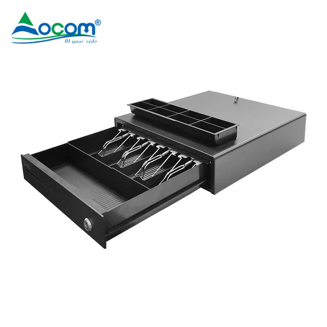 Kasë lekësh heavy-duty OCOM ECD-335X me 4 ndarje kartëmonedhash dhe 8 ndarje monedhash, e përshtatshme për markete, dyqane dhe pika POS në Shqipëri.